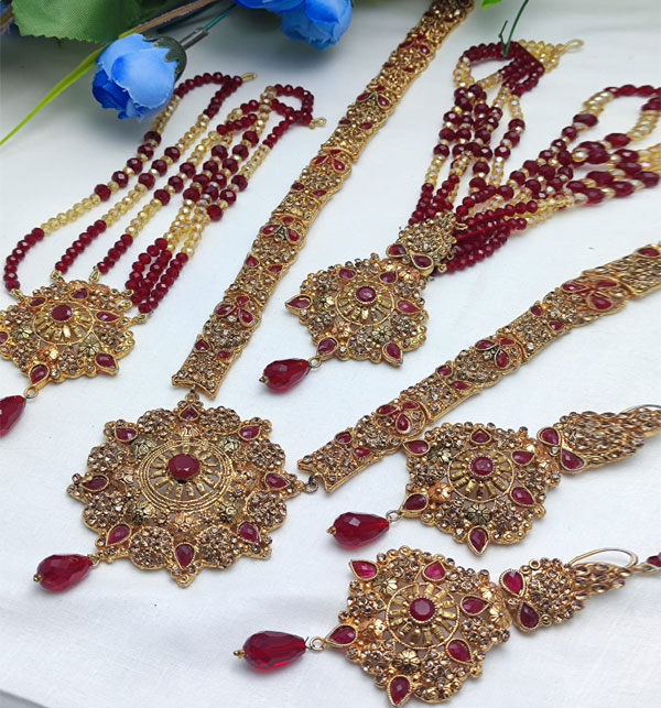Buy Saraf RS Jewellery Gold Plated Kundan Studded Pearl Beadded Cresent  Jhumar Passa online